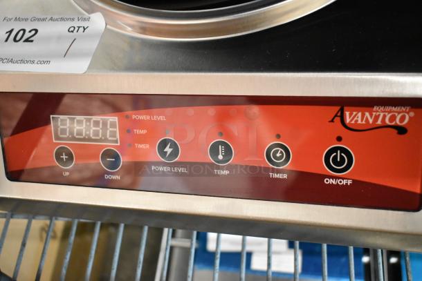 Brand new Avantco 177IWC35 stainless steel countertop wok induction range, featuring power, temp, timer controls. Scratch and dent condition.