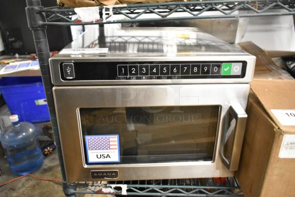 Brand new Amana HDC182 stainless steel commercial microwave, scratch and dent, push button controls, made in USA.