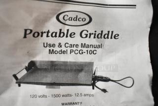 Cadco PCG-10C countertop griddle, 21"x12", 120V, 1 Phase. New with manual, minor scratches and dents visible.