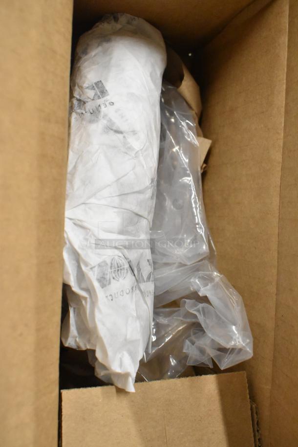 Box containing six brand new, scratch and dent items wrapped in paper and plastic. Includes Kason door hinge and release handle.