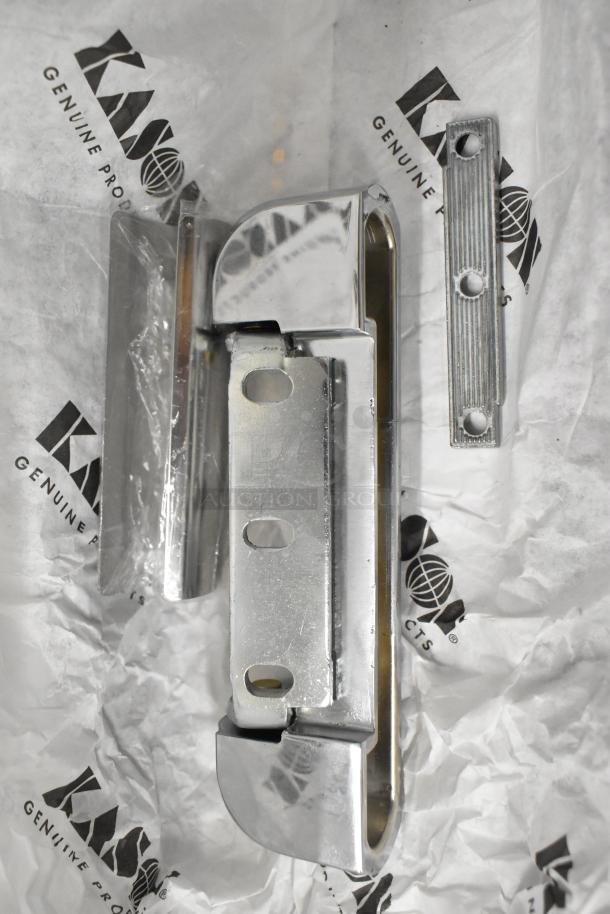 Brand new Kason door hinge and release handle on branded packaging. Slight scratches, six items lot.
