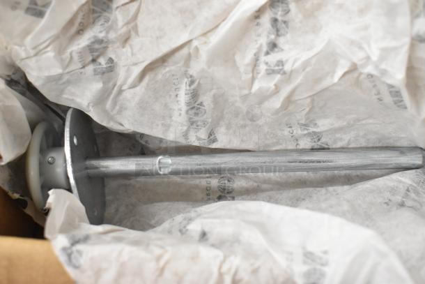 Box with Kason door hinge and release handle, brand new scratch and dent items, wrapped in paper with printed markings.