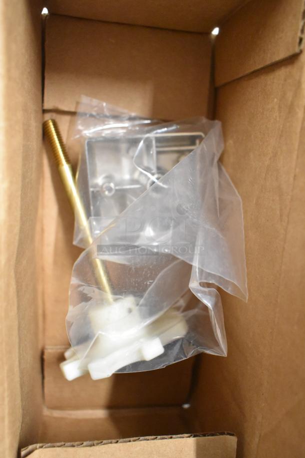 New Kason door hinge in packaging, part of a lot of 6 scratch and dent items, enclosed in a cardboard box.