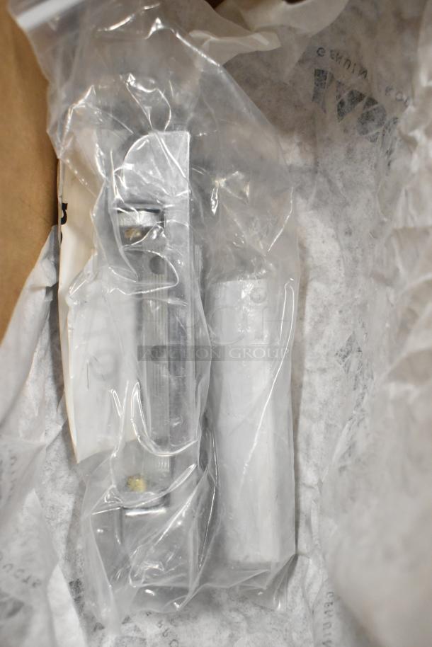 Brand new Kason door hinge and release handle, sealed in plastic. Scratch and dent items included in sale.