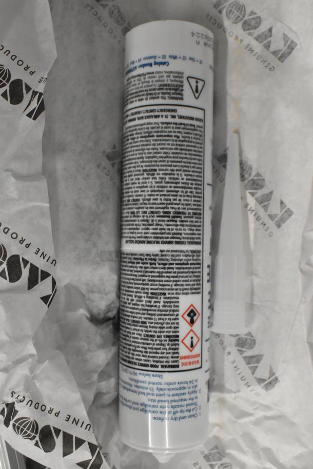 Kason caulk tube with detailed instructions and hazard warnings, wrapped in branded Kason paper. New condition.