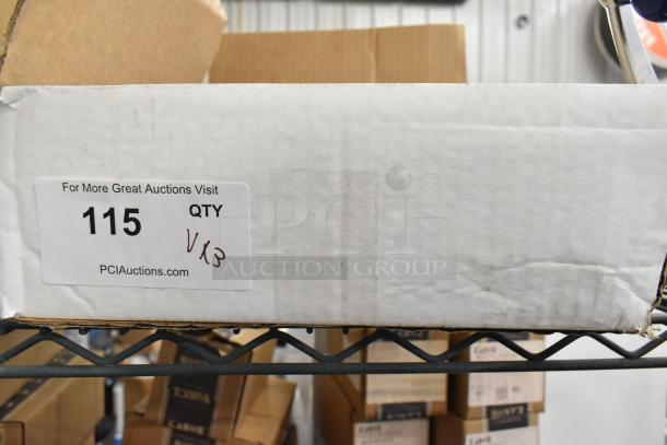 Cardboard box labeled "115" on a shelf, contains assorted items including a metal can opener and a microphone.