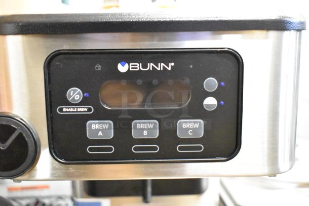 Alt text: Bunn 52200.0100 ITCB-DV Infusion Brewer control panel, featuring brew settings A, B, C, and power indicators.