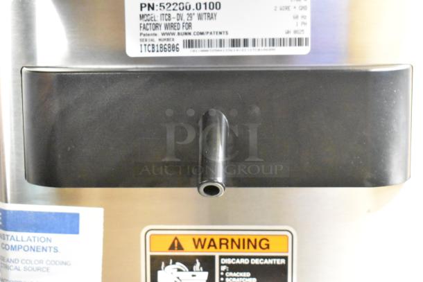 Bunn ITCB-DV Coffee and Tea Brewer, model 52200.0100, new scratch and dent, features warning label and serial info.