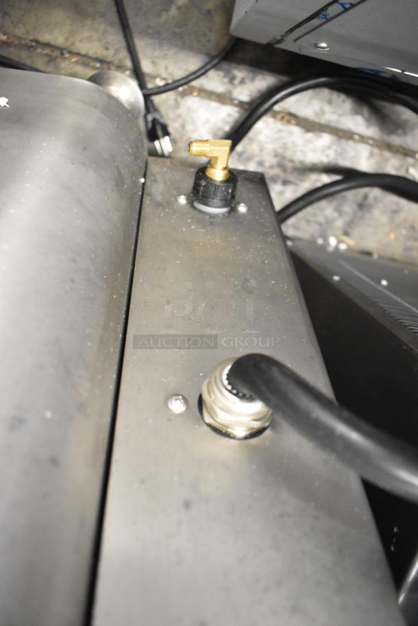 Brand new Avantco 177HWD10D stainless steel 10-gallon hot water dispenser, slight scratches, 208/240V, 1 phase.