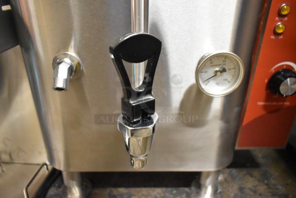 Brand new 2025 Avantco 177HWD10D stainless steel 10-gallon hot water dispenser. Features gauge, tap, scratches. 208/240V.