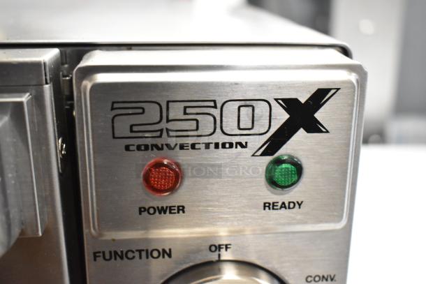 2023 Waring WCO250X stainless steel countertop convection oven, scratch and dent condition, 120V, with power and ready indicators.