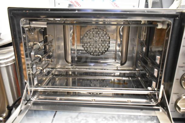 BRAND NEW Waring WCO250X stainless steel countertop convection oven, quarter size, 120 volts, slight scratches and dents.