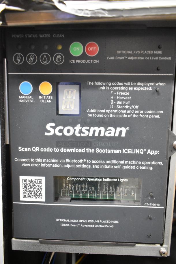 Scotsman MC0530MAX-1A stainless steel ice machine control panel, features operational codes and QR code for app download.