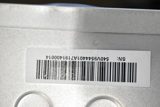 Barcode and serial number label on KoolMore KM-MD-1SS microwave drawer, stainless steel model, wall-mounted.