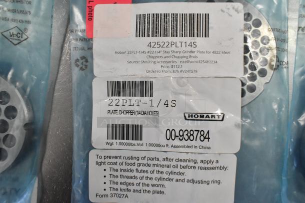 Hobart grinder plates, model 22PLT-1/4S, brand new with some dents. Includes instructions and barcode labels.