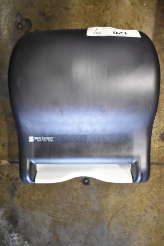 BRAND NEW San Jamar Poly Wall Mount Paper Towel Dispenser with minor scratches and dents; model marked on unit.