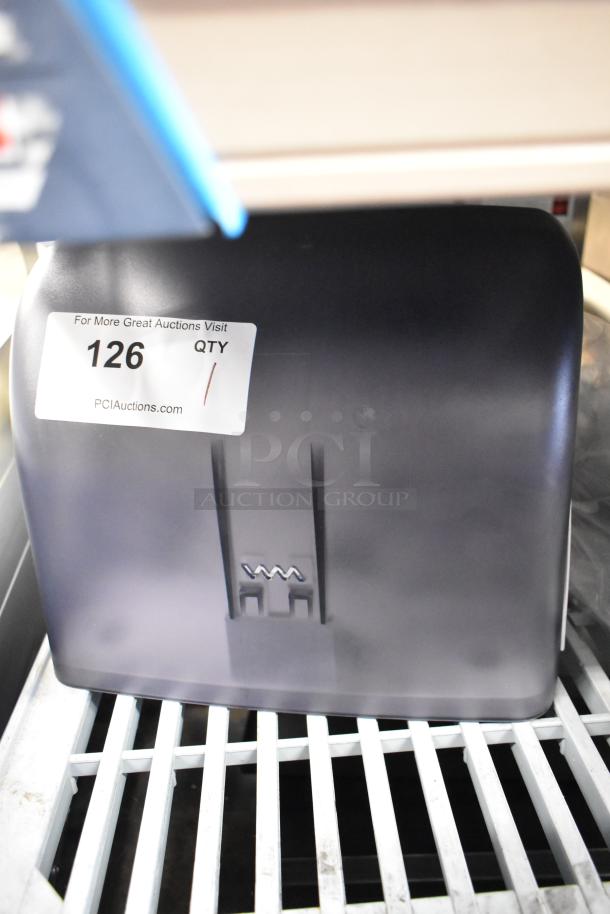 San Jamar poly wall-mount paper towel dispenser, brand new, minor scratches/dents, black finish. Auction label "126".