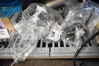 Two brand new scratch and dent control parts in packaging: Southbend HP1181998 Cook Control and Garland 240G03145048 FD Control. Auction tag visible.