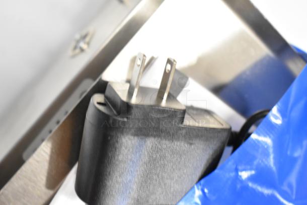 Torrey 166LEQ510 digital portion control scale, 10 lb. capacity, new with minor scratches, shows power adapter.