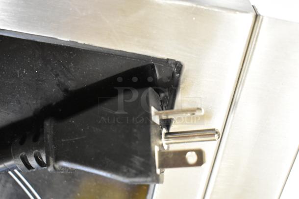 Close-up of the power plug for Avantco 177IC3500 stainless steel induction cooker. Features 208-240 volt, 1 phase plug.
