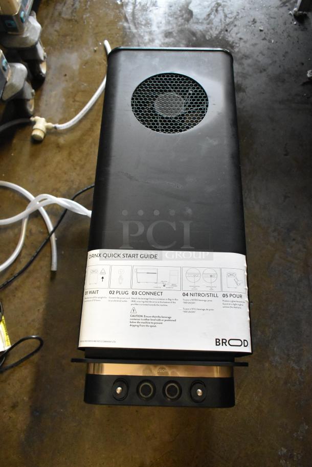 BRAND NEW Fetco DRNX SLM DUO Dual Tap Nitro Cold Brew Dispenser, 120V, Scratch and Dent, quick start guide visible.