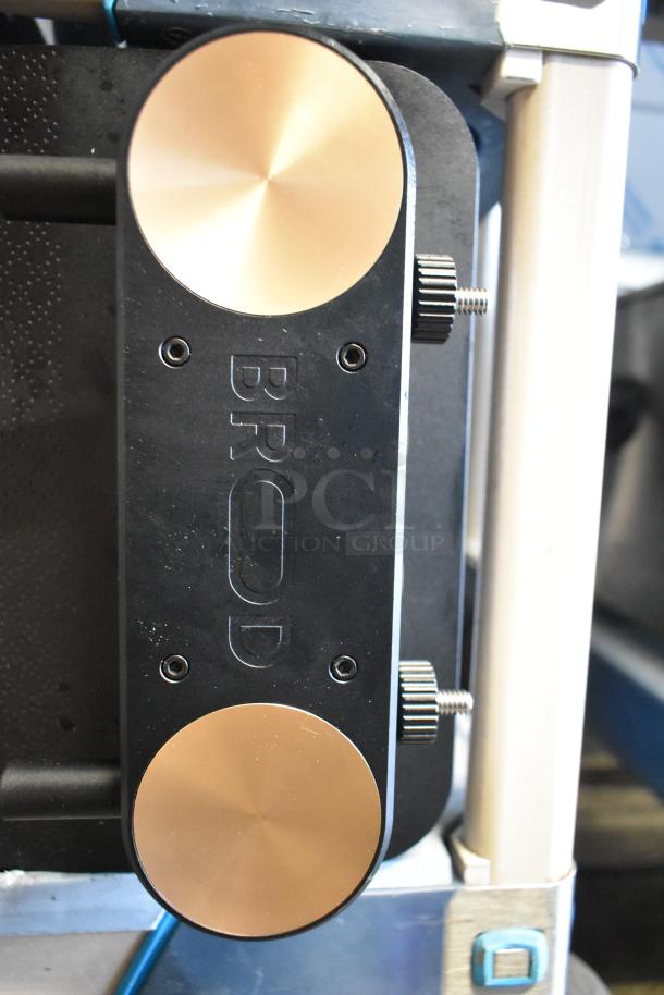 BRAND NEW SCRATCH AND DENT! Fetco DRNX by BROOD DUO dual tap dispenser, model DRNX SLM DUO, with visible branding.