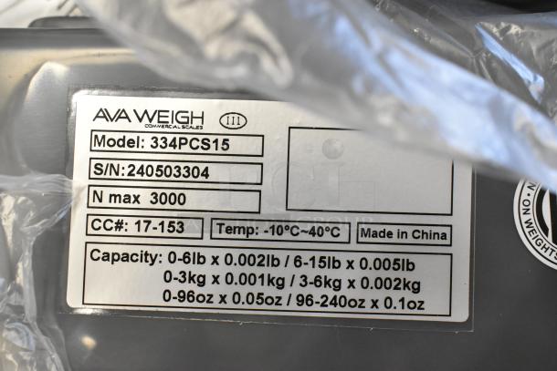 BRAND NEW AvaWeigh 334PCS15 15 lb. Digital Price Computing Scale, serial number 240503304, scratch and dent condition.
