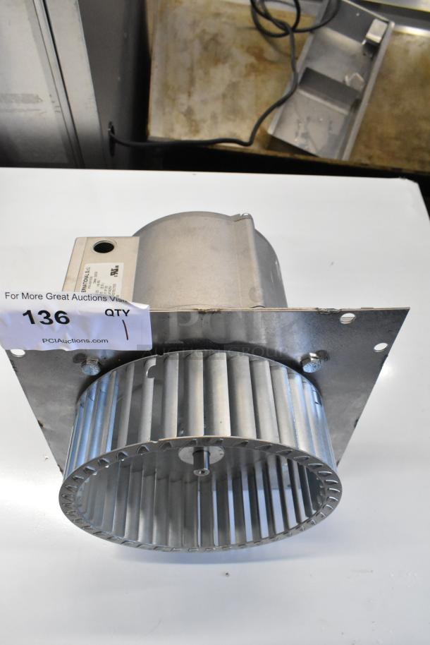 Brand new Nidec motor for convection oven, 2024 model, 115-120 volts, 1 phase, scratch and dent condition, auction tag visible.