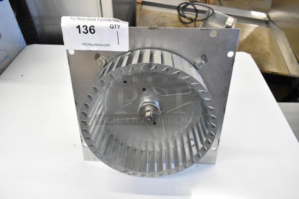 BRAND NEW 2024 Nidec motor for convection oven, 115-120 volts, 1 phase, scratch and dent condition, auction tag visible.
