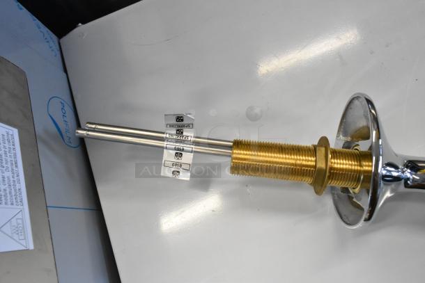 Brand new scratch and dent stainless steel 2 tap beer tower, showing tap pipes and base with labels indicating "Cold" and "Sparkling."