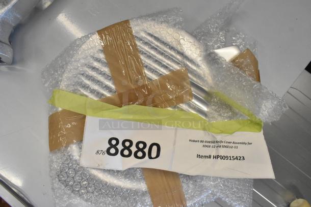 Hobart Knife Cover Assembly EDGE-12, item HP00915423, new, packaged with bubble wrap and labeled "8880".