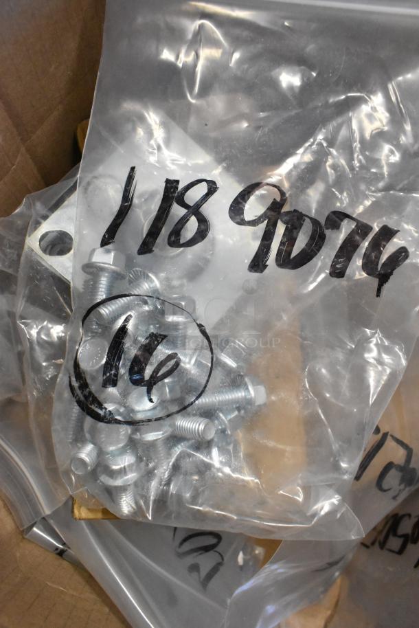 Lot of new screws and washers in plastic bag with handwritten numbers. Condition: scratch and dent.