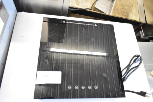 Brand new Avantco 177ICW300 black induction warmer, 16"x16", 120V, 1-phase, minor scratches, countertop model.