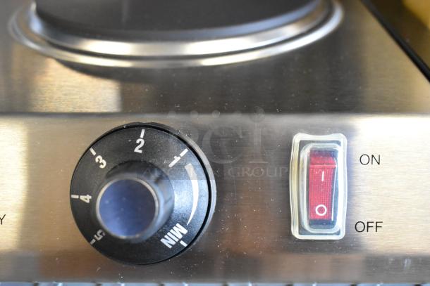 BRAND NEW Waring WDB600 Double Burner Range, solid top, 2023 model, 120 volts, scratches/dents, black dial, red on/off switch.