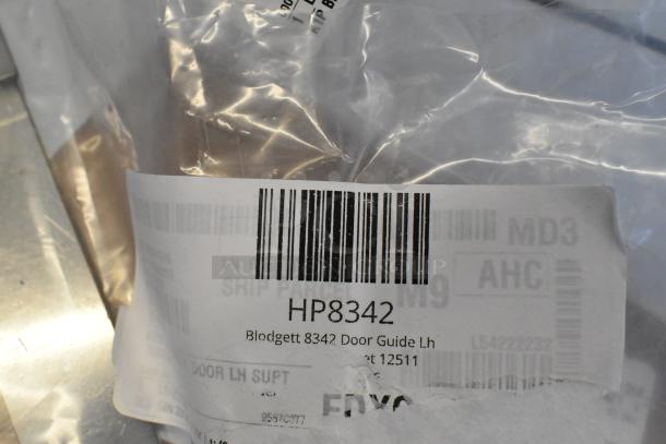 Bag containing Blodgett 8342 Door Guide LH, labeled with barcode HP8342. New condition, part of a 5-item auction lot.