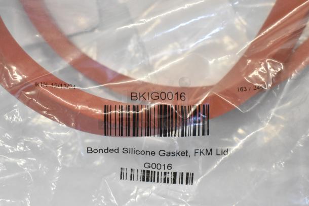 BKI G0026 Lid Gasket in unopened packaging. Visible markings: "BKIG0016," "Bonded Silicone Gasket, FKM Lid," "G0016."