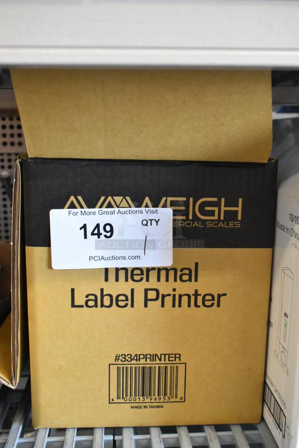 BRAND NEW SCRATCH AND DENT AvaWeigh 334PRINTER Thermal Label Printer for price computing scales, includes labels. Box shows barcode and "Made in Taiwan."