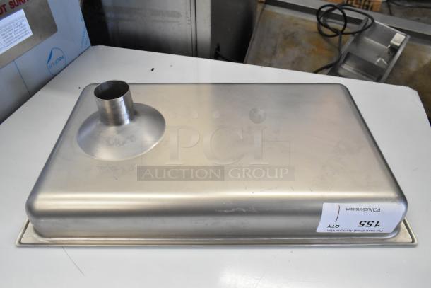 Brand new metal tray for meat grinder, scratch and dent condition. Rectangular shape with funnel. Label shows "Lot 155."