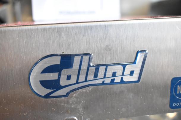 Edlund 350 Electric Slicer, brand new with scratches and dents. Stainless steel finish. Model number visible. 115V, 1 Phase.
