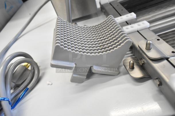 Brand new Edlund 350 electric slicer for fruits and vegetables. Scratch and dent condition. 115V, 1 phase, durable stainless steel.