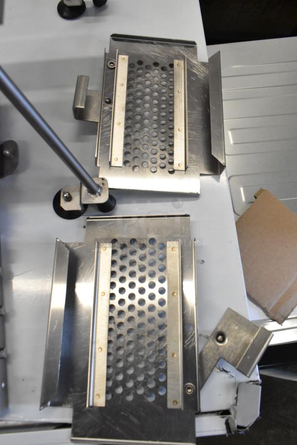 New Edlund 350 Electric Slicer, 115V, 1 Phase, stainless steel, with minor scratches and dents, for fruits and vegetables.