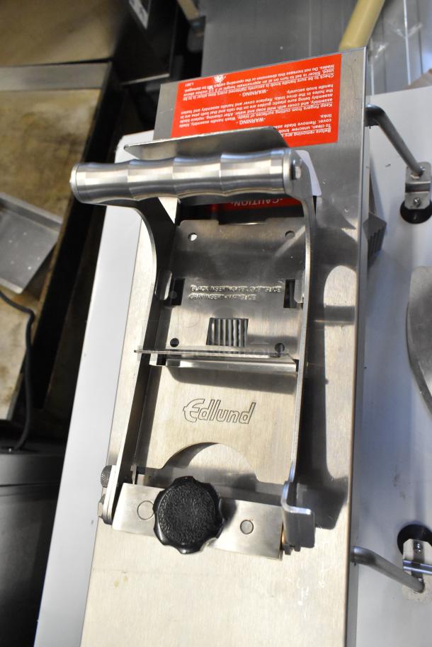 BRAND NEW SCRATCH AND DENT Edlund 350 Electric Slicer. Features durable metal body, visible Edlund logo, 115V, 1 Phase.