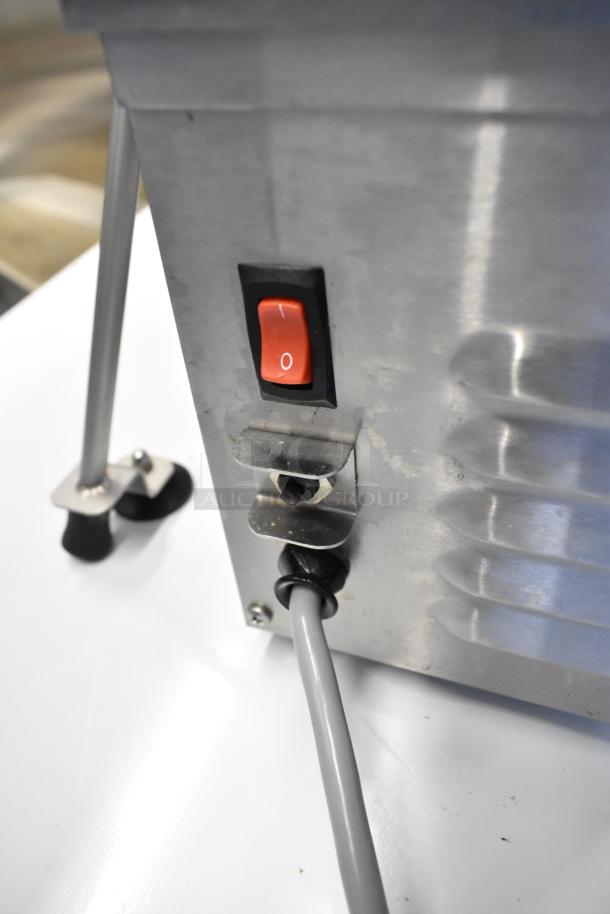 BRAND NEW Edlund 350 Electric Slicer, 115V, 1 Phase. Slight scratch and dent. Red switch visible, sturdy stand.