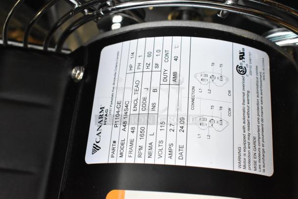BRAND NEW Canarm S12-E1 12" wall exhaust fan. 1-speed, 1,640 CFM, 1-phase, 1/4 hp. Scratch and dent condition. Labels show technical specs and safety warnings.
