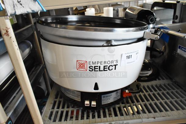 Brand new Emperor's Select EGRC 478EGRC140LP gas rice cooker. 140 cup capacity, 24,000 BTU, visible brand logo.