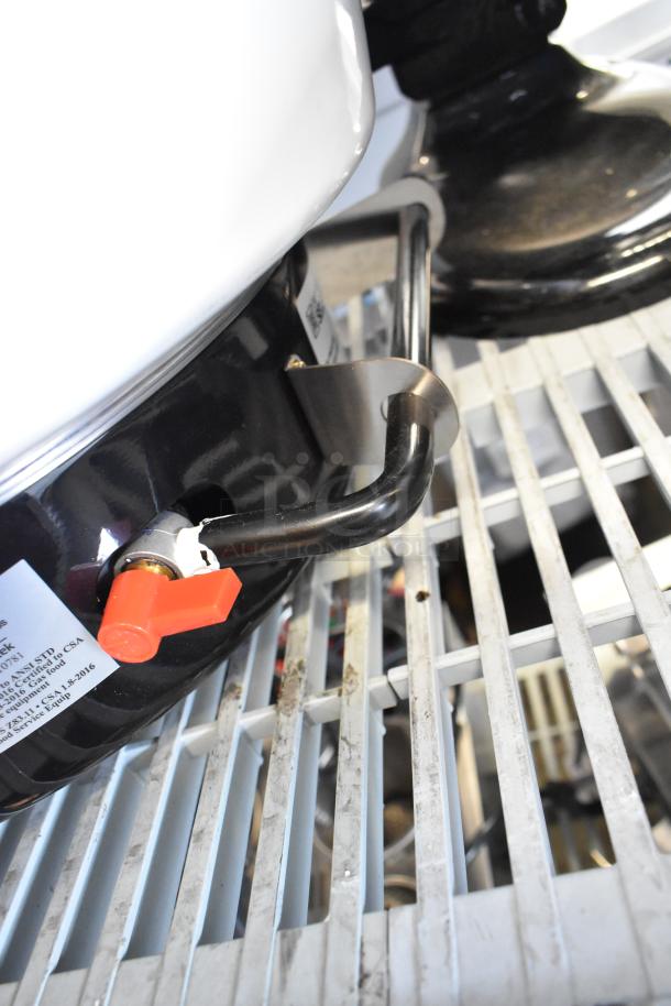 BRAND NEW Emperor's Select 478EGRC140LP LP gas rice cooker, 140-cup capacity, 24,000 BTU, visible control valve, scratch and dent condition.