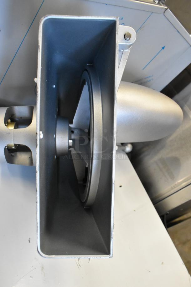 Brand new metal commercial pelican head with grating blade, shows minor scratches. Ideal for commercial food prep.