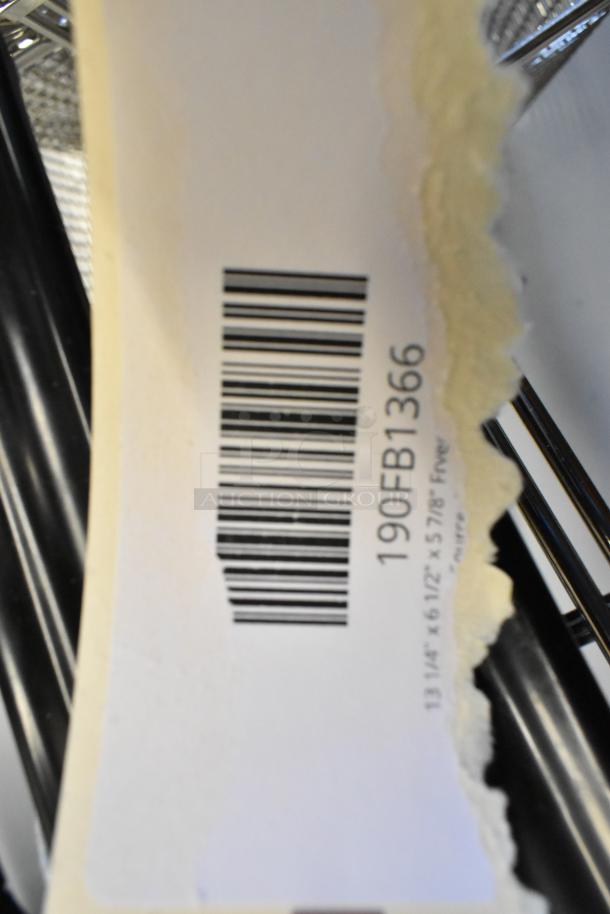 Barcode label on a 13 1/4" x 6 1/2" x 5 7/8" fryer basket, model 190FB1366. Marks item as scratch and dent.