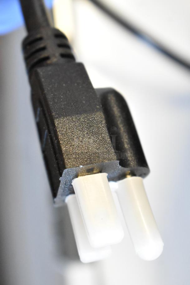 Close-up of a power plug for a Galaxy 177GSW11 11 Qt. Soup Kettle Warmer, 110 Volts, 1 Phase, new condition.