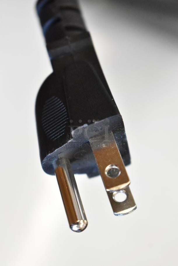 Close-up of the power plug from a 2024 AvaMix 928HBX2000 commercial blender, new condition, 120 volts.